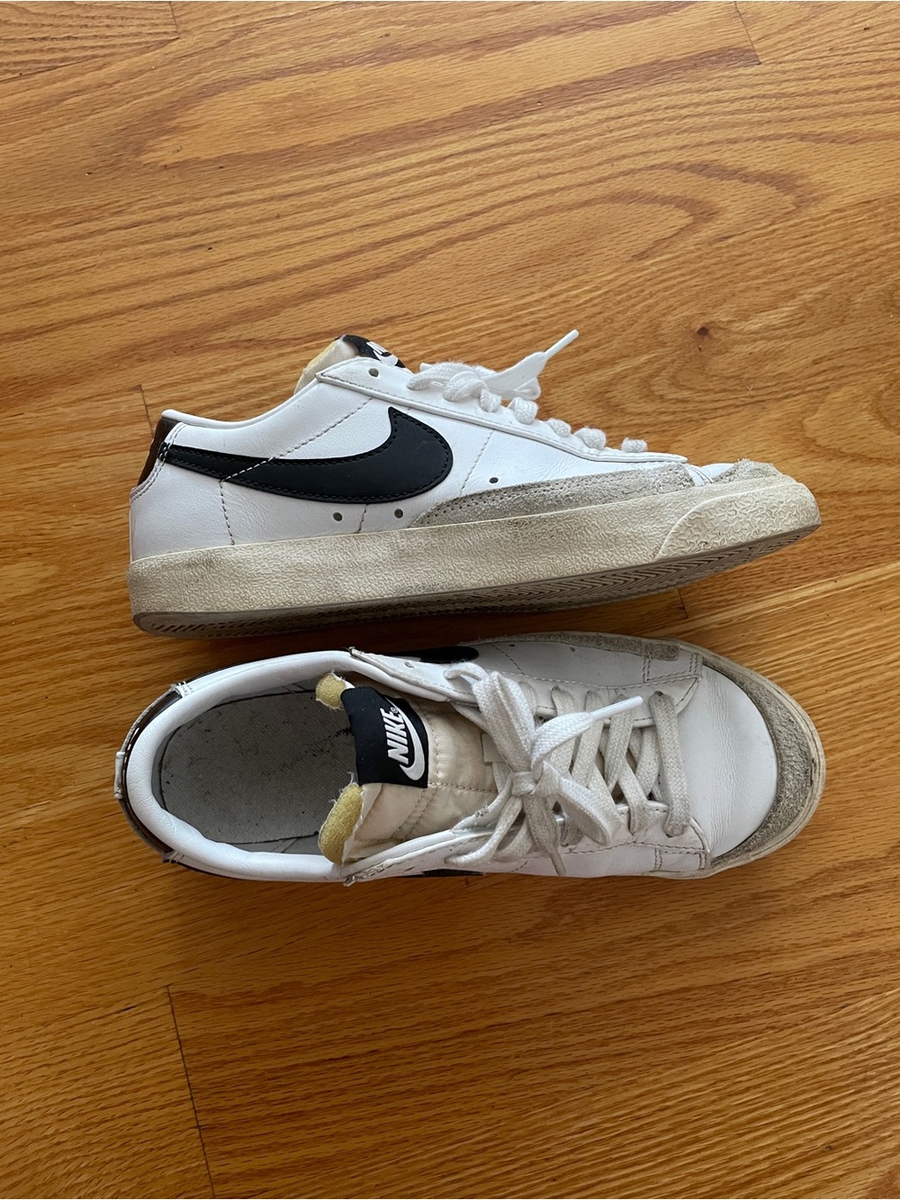 Nike White Low-Top Sneakers with Black Swoosh Accent